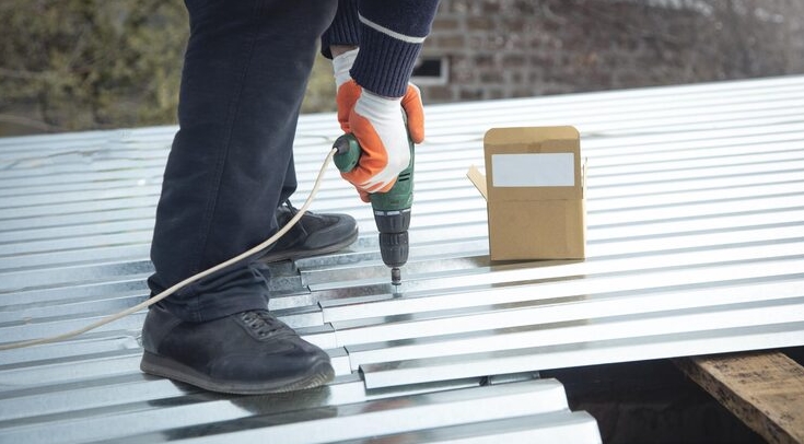Replacing a degraded roofing screw and installing a custom Colorbond metal patch with neutral-cure silicone.
