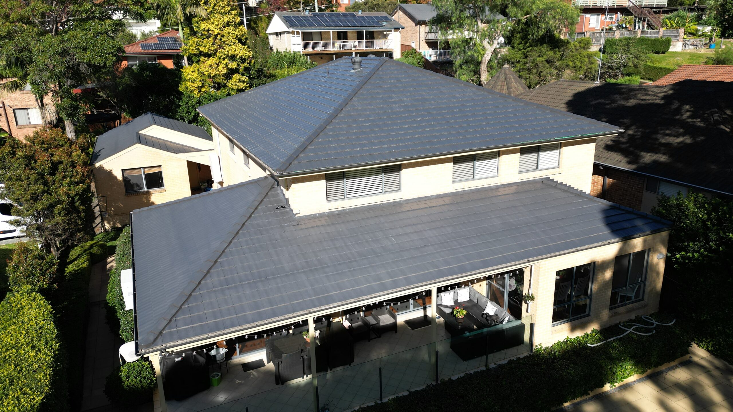 Storm damaged metal roof requiring urgent leak repair and restoration