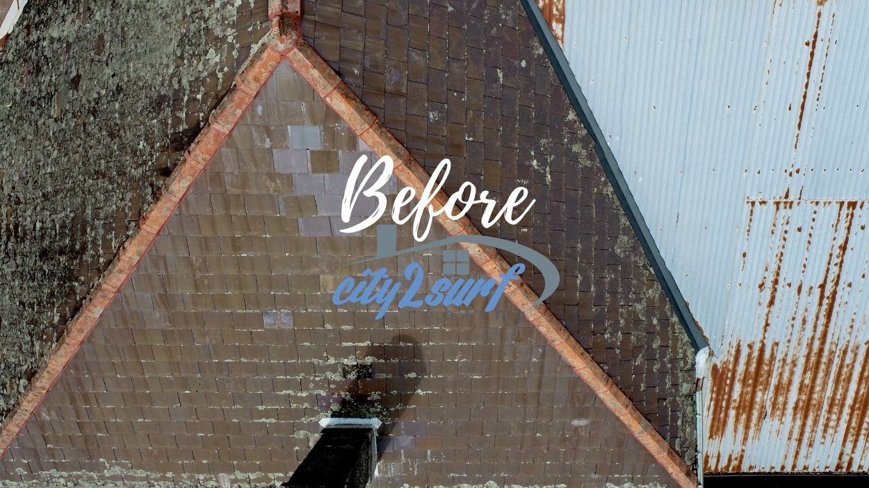 Weathered brown-tiled roof with moss and peeling paint, overlaid with the word 'Before' and a blue 'city2surf' logo.
